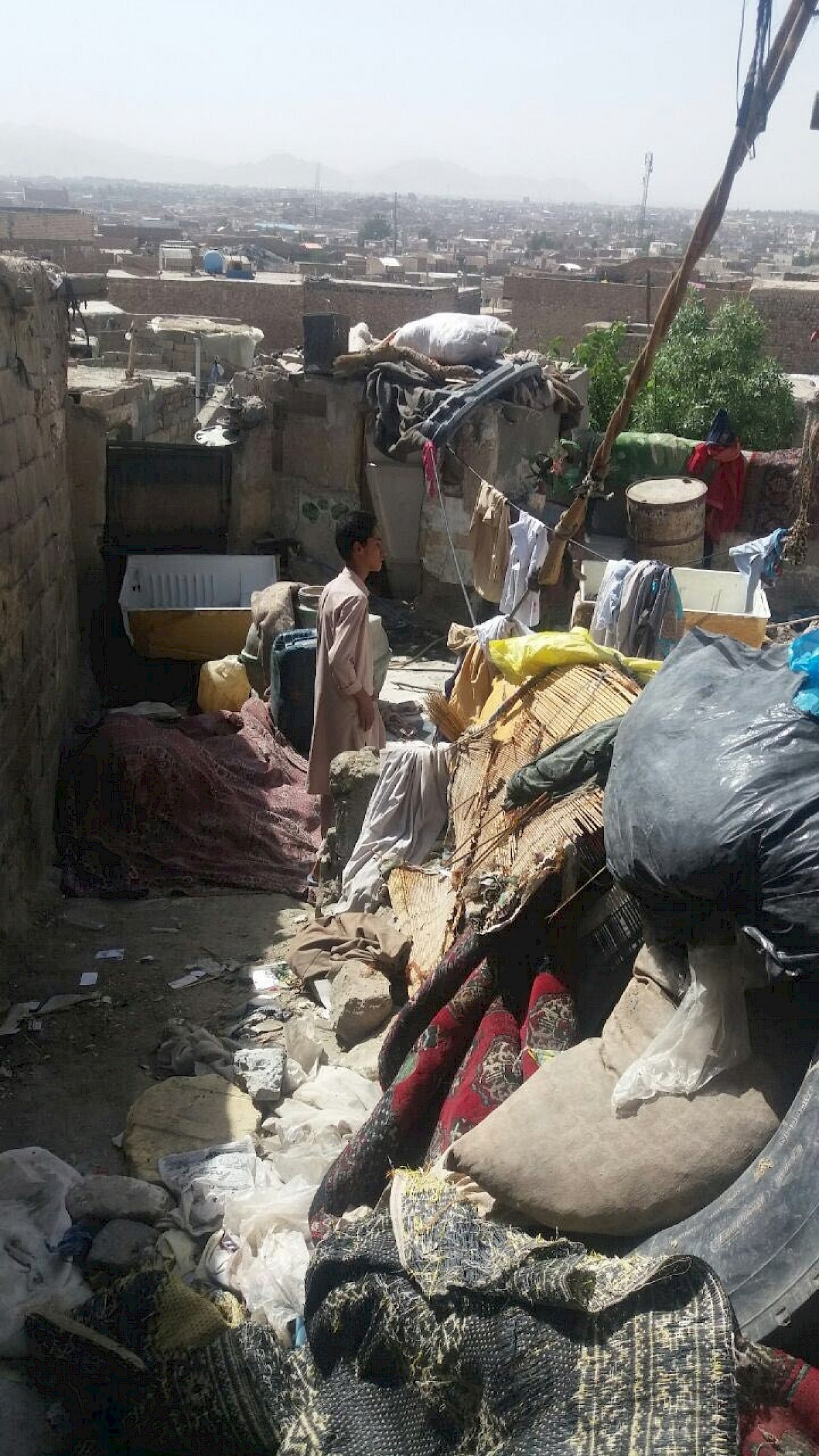 Rubbish and useless stuff collected and stored by a refugee family. Refugee inhabited area in poor living condition, Zahedan City, Iran. ©RI Team,2017